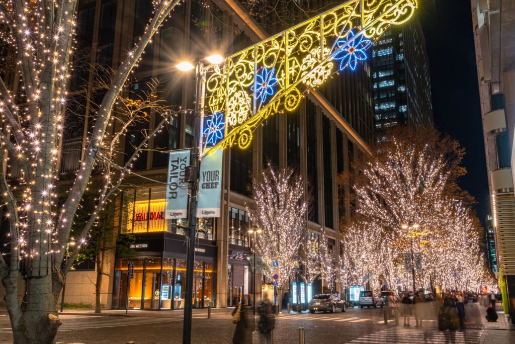 Glowing Christmas Lights And Trees On The Street