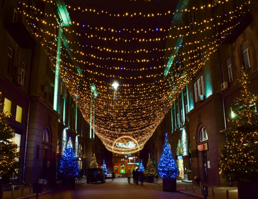 Glowing Yellow Christmas Lights And Trees