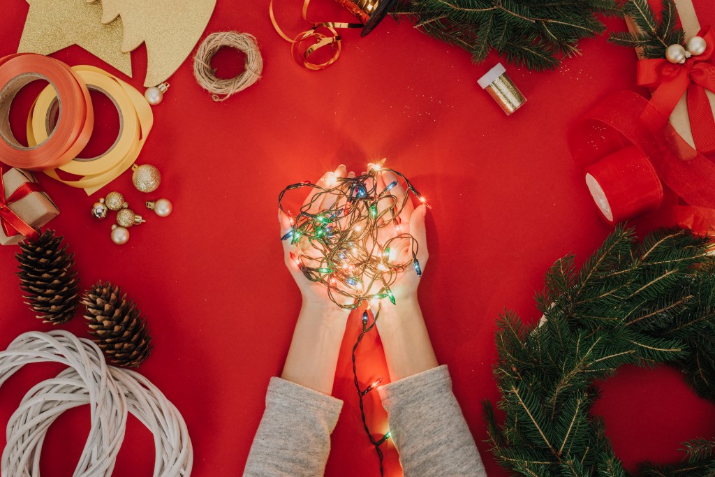 Holding Christmas Lights